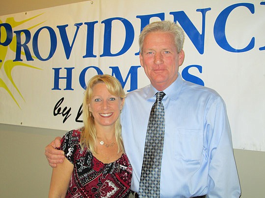 Cheryl Hall and Robert Goettlicher of Providence Homes greeted Realtors last month as their company combined with Lennar and D.R. Horton to introduce Realtors to their Yellow Bluff Landing development in North Jacksonville.