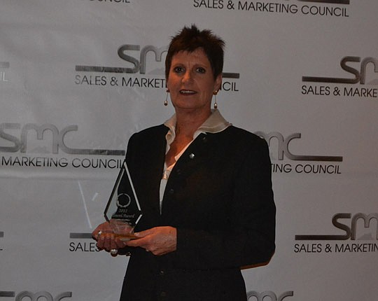Judy Hicks and her award