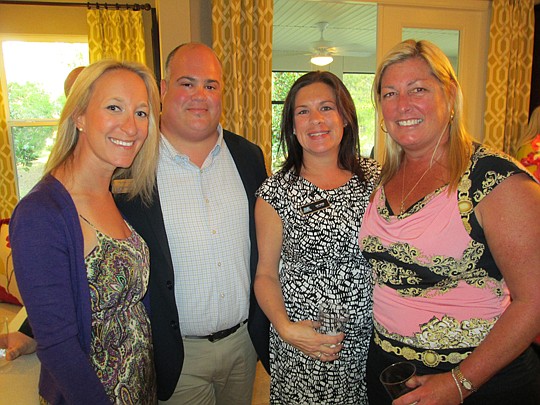 The Sales and Marketing Council held a social last month at a Richmond American Homes model in Glenlaurel Estates in Mandarin. Amy Webb of Exit Real Estate Gallery (second from right) was welcomed by Ashley Davis, Paul Masciarelli and Kelli Caldwell B...