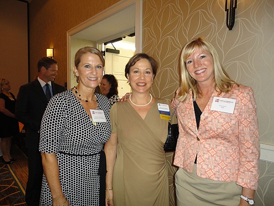 Faces in the crowd at last month's meeting of the Jacksonville chapter of the Commercial Real Estate Women included Kimberly Waterhouse of Allied Barton, CREW President Suzanne Cortina of King Engineering and  Traci Jenks of CB Richard Ellis.
