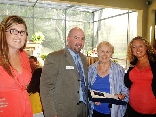 The winner was Dot Sneed of Coldwell Banker Vanguard Realty (second from right). She's with Stacey Varner, David Weekley Homes; Jason Kinder, Bank of England and Denise Patricolo, David Weekley Homes.