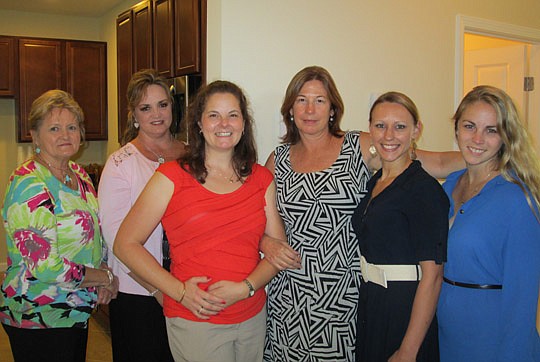 Landon Homes held a grand opening of its new model at The Cape in North Jacksonville last month and visitors were welcomed by Landon's Kay Hall, Mary Spears, Marnee Oehmann, Jackie Matthews, Nicole Smagala and Kristin Burgess.