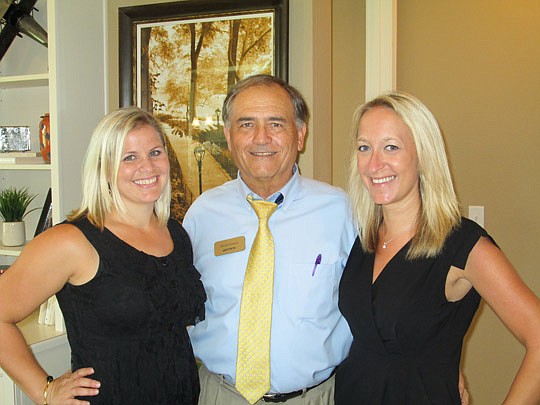 Misti Hinshaw, David Virtuoso and Ashley Davis were among the Richmond American team that greeted guests.
