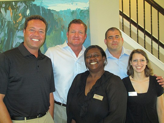 D.R. Horton held a grand opening for its new model last month at the Verde Gardens development and greeting guests were Mike Murphy, Tom Cavanaugh, Mary Jones, Mike Koren and Megan Reagor, all of D.R. Horton &amp; DHI Mortgage.