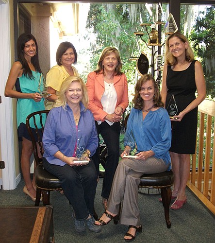 The Clockwork Marketing Services Team consisting of (front, from left) Liz McCarthy , Laura Jane Pittman, (back row, from left) Nathalie Lobefaro, Debbie Cinnani, Maxine McBride and Tami McClaran possesses the combination of talents, experience and cr...