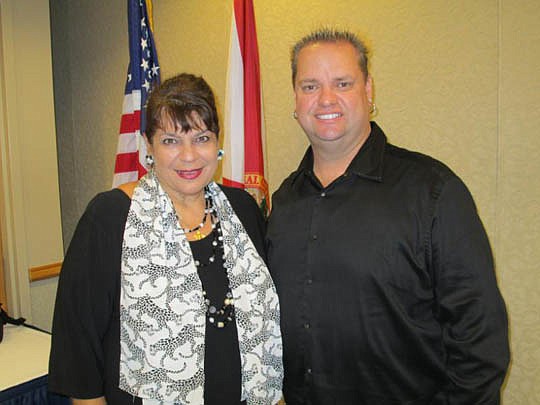 State Attorney Angela Corey was last month's speaker at the Women's Council of Realtors meeting at the University of North Florida University Center. She's here with WCR President Andrew Bell of Watson Realty.