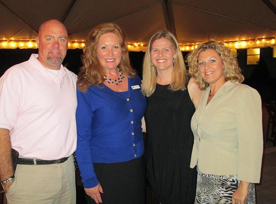 Among the Standard Pacific team members greeting guests were (from left) Chuck Bolen, Jaime Smith, Jennifer Hendry and Harmony Munger.