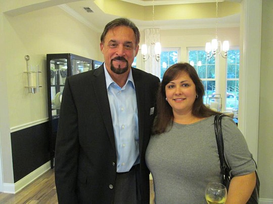 Andy Fremento with Tammy Bacmeister of DHI Mortgage.