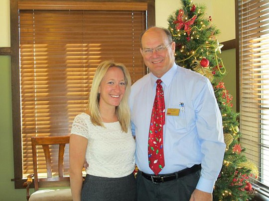 Above,Â Ashley Davis of Richmond American is with Milt Hnyla of Watson Realty