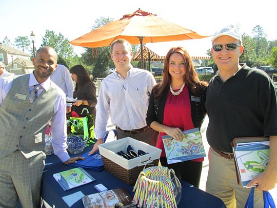 Lateef Warnick, Watson Realty; Chris Wood and Cindy Walters, Riverside Homes; and Charles Moody.