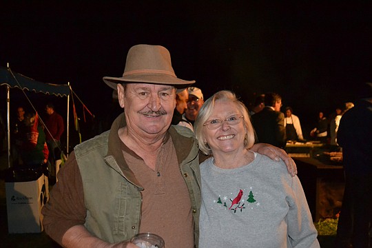 Event sponsors Johnny and Ann Myers enjoy the Nassau Builders Council's Christmas Oyster Roast.