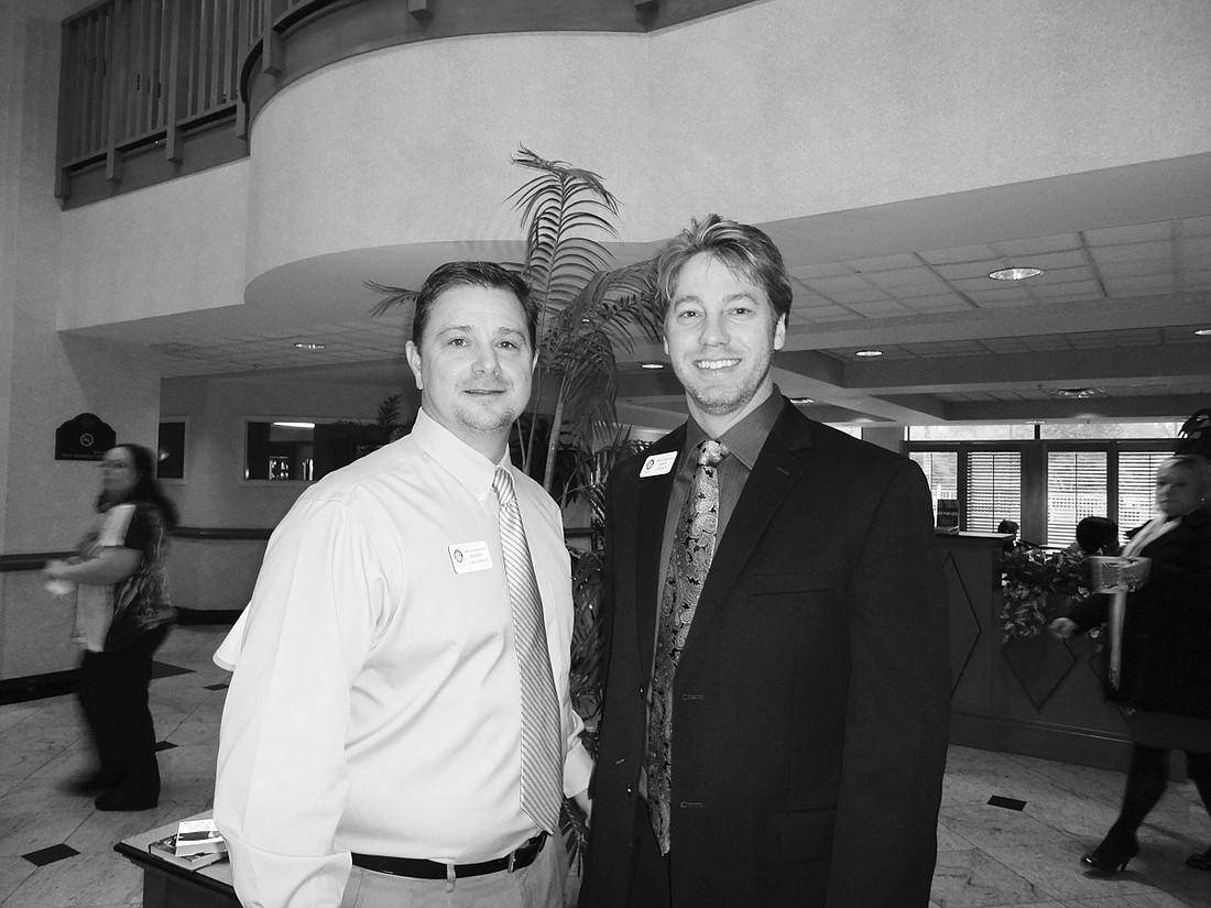 The presidents: Randy Galloway of Real Estate Mortgage Network, president of the Mortgage Bankers Association of Jacksonville, with incoming president Mick Dolan of Mason Title at last month's MBA meeting at the Wyndham Jacksonville hotel.