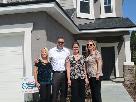 From left, Cheryl Hall, Erik Head, Melissa Meide Matthews and Tracy Stout, Providence Homes.