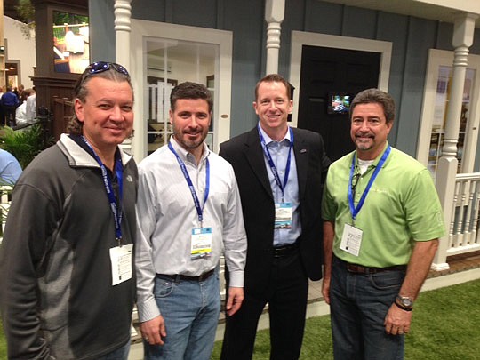 NEFBA President Daniel Blanchard (second from right) checks out exhibits at the International Builders Show in Las Vegas with past presidents (from left) Dennis Ginder, Michael BourrÃ© and Glenn Layton.