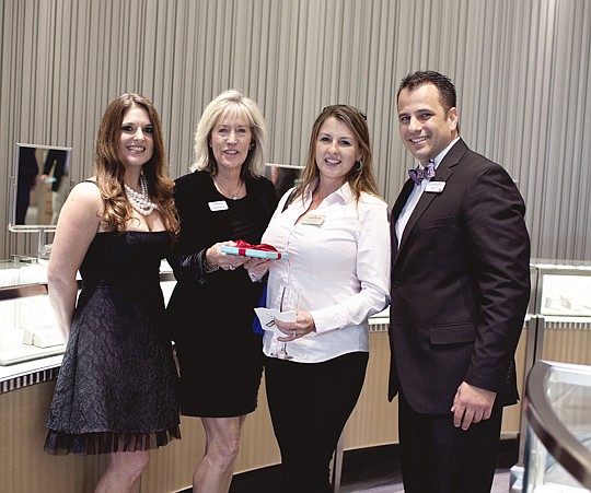 Amber Williams, marketing and online sales manager, Lennar Homes LLC; Barbara Moore, division president, Lennar; Eva Davis, Keller Williams Realty; and Matt Figlesthaler, director of sales, Lennar.