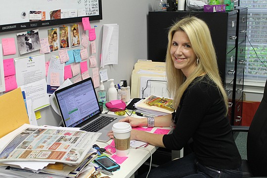 CC Underwood, a Realtor for Keller Williams Jacksonville, describes herself as a business builder and a collaborator who likes to juggle many tasks at once. A cup of coffee, mini candy bars and dozens of sticky notes are ever present at her workspace.