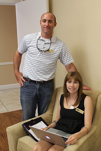 Matt Wilford with his wife, Ashley. Wilford is the executive director of Builders Care, the charitable arm of the Northeast Florida Builders Association. The group, which renovates homes for Jacksonville's neediest residents, is growing again after th...