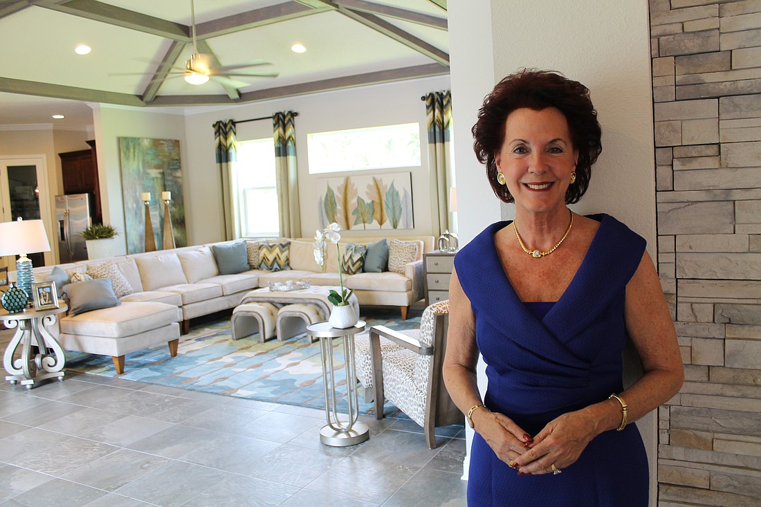 Interior designer Judith Sisler Johnston strives to create a home that people can call their own when she merchandises models for builders. For the Madeline model at Tamaya (pictured here), she chose the beach feeling of a courtyard home "between the ...