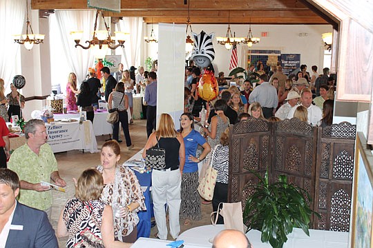 The Women's Council of Realtors held its annual trade show in June at Casa Marina in Jacksonville Beach. The safari-themed event showcased products and services of the council's affiliate members, including lending companies and property inspectors.