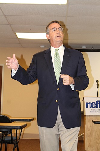 Florida CFO Jeff Atwater said businesses are behind the state's recovering economy. Atwater faces re-election this year.