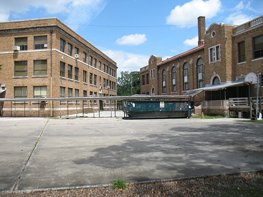 John Gorrie Junior High was converted to condominiums and townhomes during a recessionary trough in local condo construction. Just over half of the units have sold.