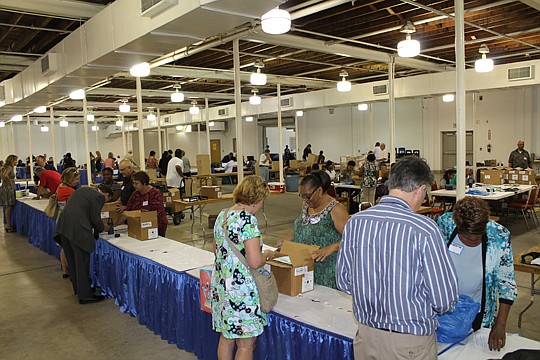 The Northeast Florida Association of Realtors spent five days in August distributing 18,000 new lockboxes to association members. The new system allows agents to access the lockbox from an app on their smartphones.