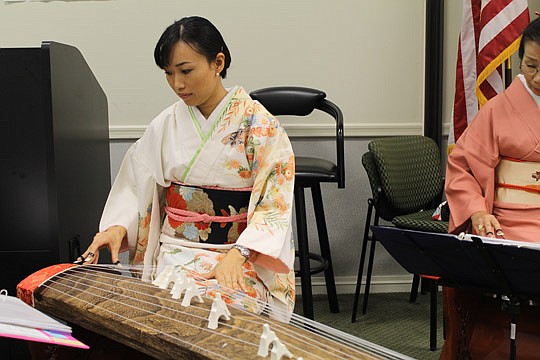 At the Global Business Council's international conference, musicians from a local group, Kokoro (Japanese for "heart"), played kotos, a traditional Japanese instrument that's similar to a zither.