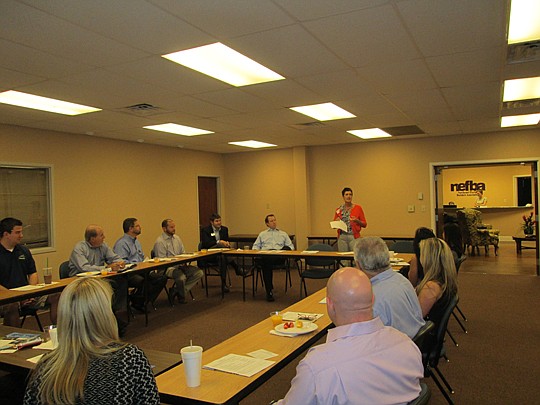The Northeast Florida Builders Association held an orientation last month for new Sales and Marketing Council members and new NEFBA leaders. Above, Judy Hicks, 2014 SMC membership chairwoman, discusses member benefits.