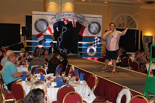 Andrew Bell of The Legends of Real Estate East Coast was master of ceremonies at the Women's Council of Realtors' annual fashion show fundraiser. This year's theme was Cruzin' thru the Day.