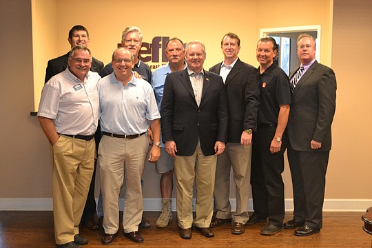 2015 NAHB Chair Kevin Kelly meets NEFBA's executive committee: (from left, front row) Larry Witmer, Rick Morales, Kelly, Daniel Blanchard, Dennis Ginder and Jerry Linder; (back row) Corey Deal, Harlan Bost and Keith Ward.