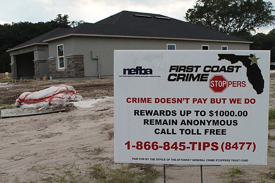 Newly finished homes are vulnerable to theft. One precaution builders can take is encouraging neighbors to report suspicious activity to Crime Stoppers, an anonymous tip line that pays cash rewards. (Photo is of a new home under construction by KB Hom...