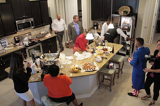 Lennar treated VIP guests to wine and tapas at an October Realtor event at the company's model at Oakridge Landing. Lennar and Richmond American Homes are building in the new community, located in northwest St. Johns County. Also within the last two m...