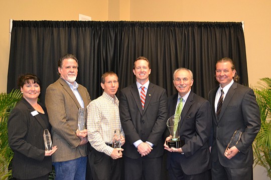 All NEFBA members are invited and encouraged to attend the Jan. 16 installation event to launch an exciting new year. Last year's award winners are congratulated by 2014 President Daniel Blanchard. From left, Janna Thomas, Bill Lazar, Greg Matovina, B...