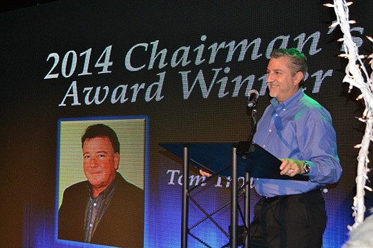 Remodelers Council Chairman Vince Pessolano, with Universal Design Solutions, announces Tom Trout as winner of the 2014 Chairman's Award.
