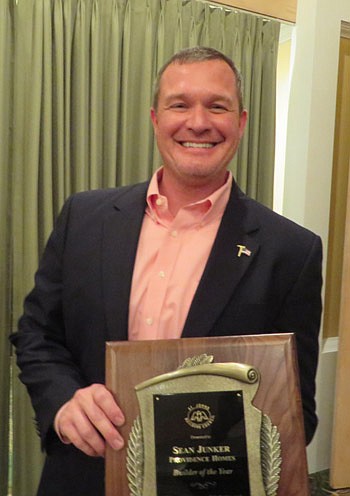 Sean Junker, left, of Providence was named SJBC Builder of the Year.