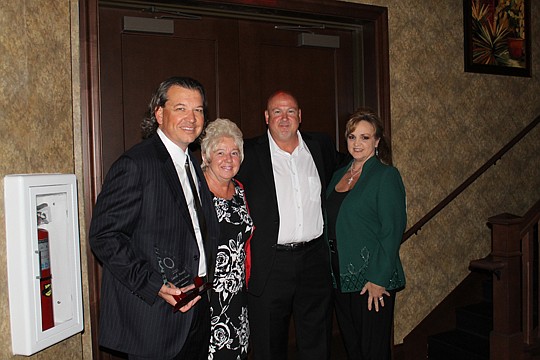 Dennis Ginder, Rossy Mavety, David Bell and Mary SpearsÂ accepted the Golden Service Award for Landon Homes at the 2013 awards. Not pictured is Jacki Matthews.
