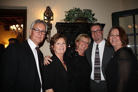 Berkshire Hathaway HomeServices Florida Network Realty honored its top producers with dinner, live music and entertainment at Epping Forest Yacht &amp; Country Club in February. Above are Harland Wentz, Karen Wentz, Leslie Johnson, Rob Johnson and man...