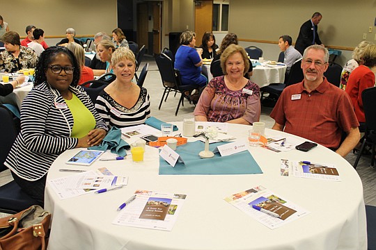 A team from Adams Homes came to the meeting in support of Sales Manager Susan Livingston, a speaker at the event. Pictured are Setina Hollis, Susan Livingston, Lavon Linn and Michael Coats.
