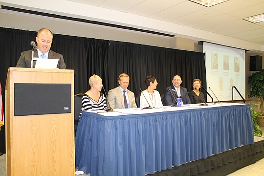 Aaron Bacus of First Guaranty Mortgage posed questions to real estate professionals from different walks of the industry at the NEFBA Sales and Marketing Council's March meeting. Panel members were Susan Livingston of Adams Homes, Ross Fanti of LMH Re...
