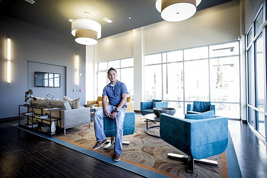 Rommel Basco was among the first residents to move into 220 Riverside.