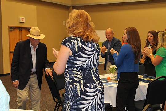 Clark received a standing ovation after addressing SMC for what he said was his final time.  A Jacksonville sales and marketing analyst with ties to the national Home Builders Association, Clark pulled together SMC's first board and has supported its ...