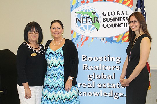 NEFAR's Global Business Council has a new logo and look. Above, Realtors Naomi Hernandez and Missi Howell, both of Watson Realty, with Ruth Lopez, associate director UNF's International Center. Lopez spoke at the council's May breakfast meeting.