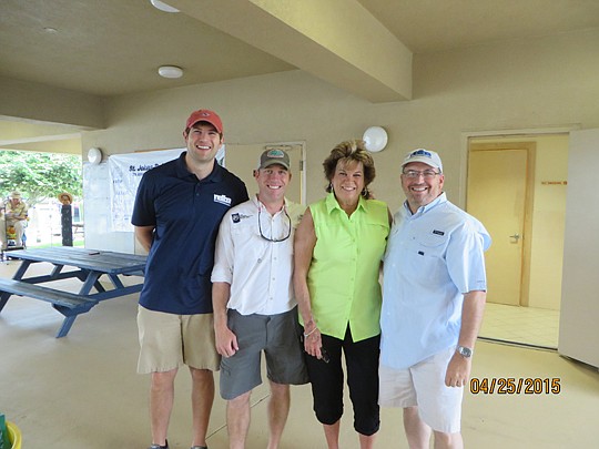 NEFBA Executive Director Corey Deal, Phoenix Environmental Group's Wes Williams (tournament chair), SJBC Director Leona Brown and NEFBA President Rick Morales (Morales Construction Company) take advantage of a beautiful day for fishing and relaxing at...