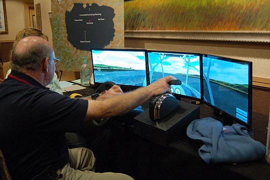 One of the new attractions at the 2014 United States Power Squadrons annual meeting is a computerized boating simulator.