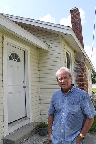 Howard White, founder of North Florida Builders, adopted one of 13 old homes that need repairs at City Rescue Mission. The homes will be used for former addicts who are transitioning back into the community. The organization has financial commitments ...
