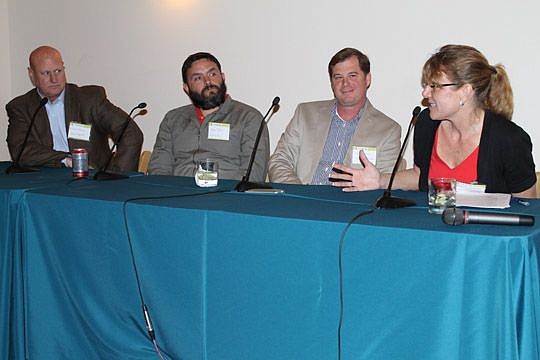 Panel members Michael Balanky, president of Chase Properties Ltd.; Ben Davis, owner of Intuition Ale Works; John Valentino, owner of Mellow Mushroom; and  Alexandra Rudzinski, director of development for the city's Office of Economic Development, disc...
