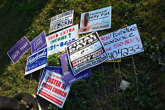 "Bandit" signs people can often see along Jacksonville roadways will be the target of an April buyback event that will pay 50 cents for each sign, with a maximum of 40 per person. Those who put the signs up illegally face a $55 fine for each offense.