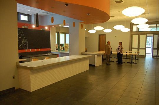 The coffee shop space near the Laura Street entrance of the Main Library Downtown is available for lease. Above are Mark Merritt, deputy director of the Jacksonville Public Library, and Kathy Lussier, communications director for the library.