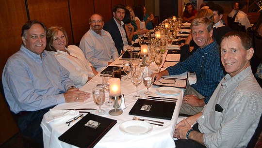 NEFBA members and staff share a table on the eve of the show. Left side of the table: Third Vice President Gene Rover and his wife, Debbie; President Rick Morales and Member Services Director Hans Krieg. Right side of the table: Past President Greg Ma...