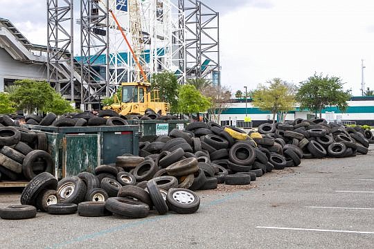 More than 23,000 tires and 6,000 illegal signs were turned in for cash Saturday during the city's buyback program. The city paid $2 per tire and 50 cents per sign to residents who turned them in. The city budgeted $65,000 for payouts and will likely u...